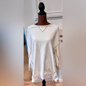 Urban Outfitters white oversized sweatshirt in medium in great condition.